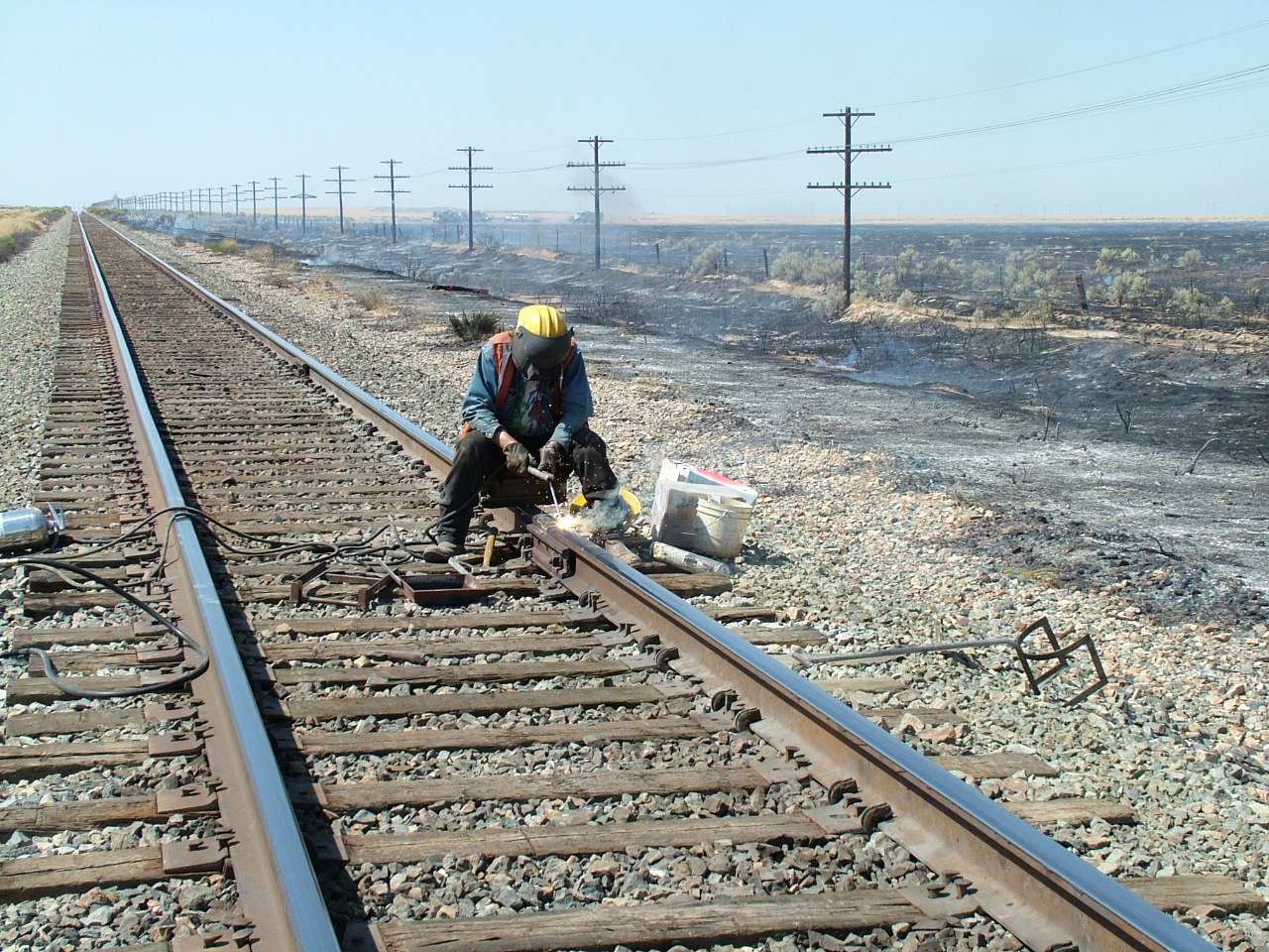 Cutting tracks causes sparks that can cause a wildfire.
