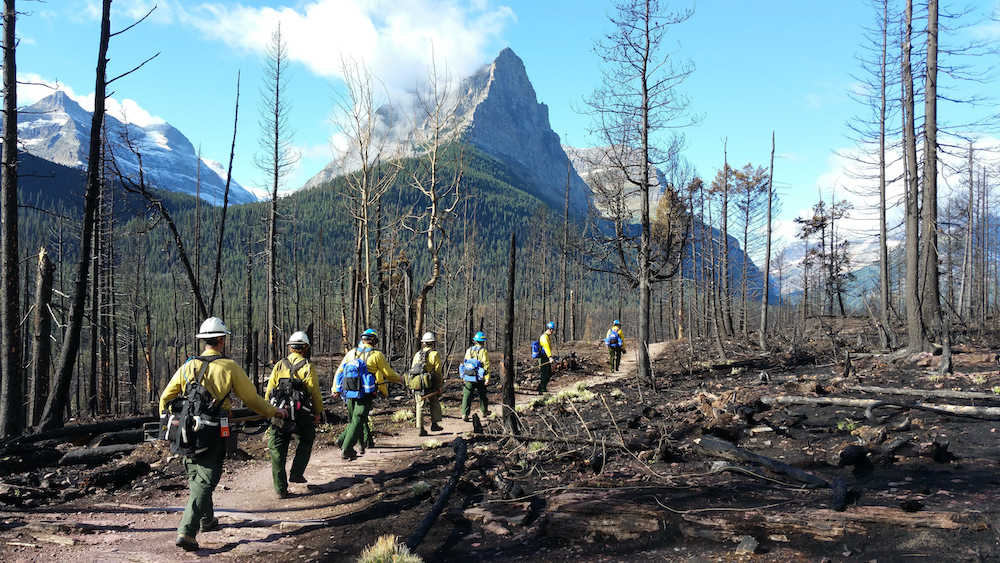 A crew hikes the the line on the Goodell Fire, National Park Service.