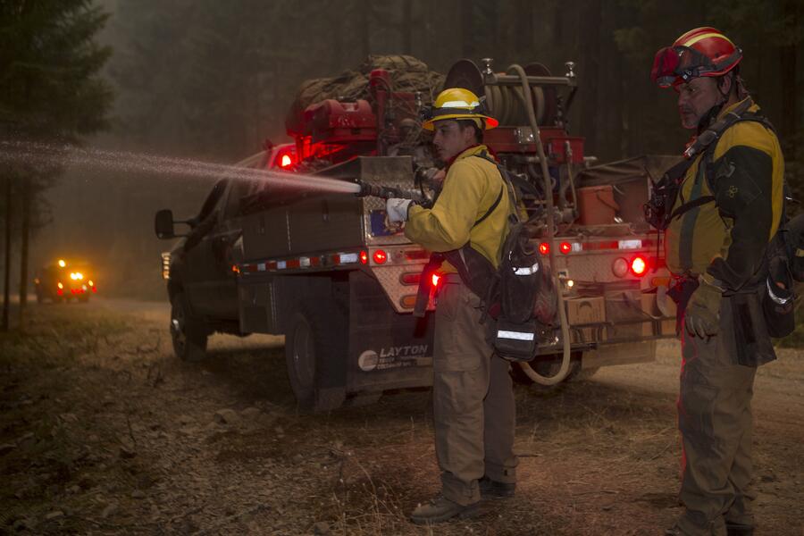 Engine Crew An engine crew works to put out a wildfire