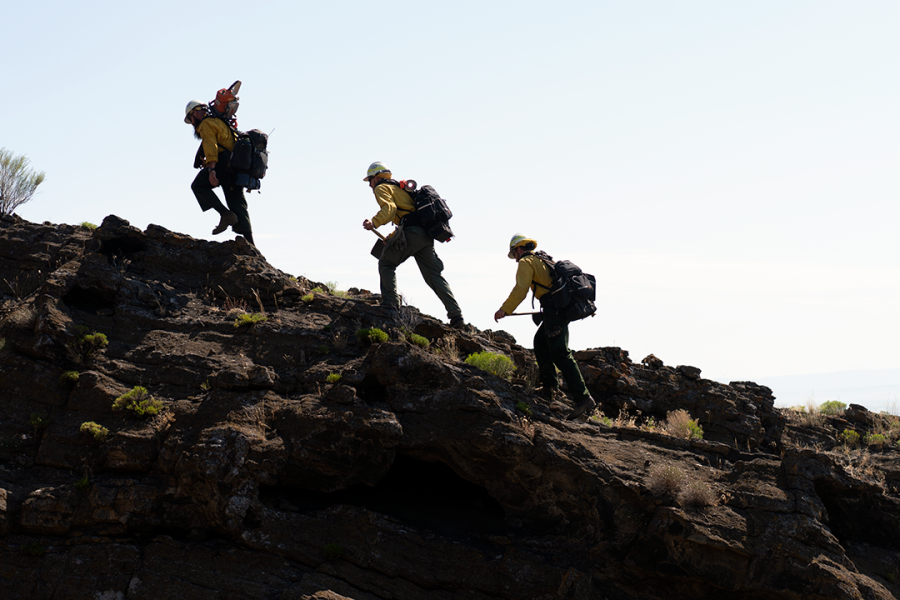Hiking up the hill. BLM wildland firefighters often hike in steep terrain.  Photo by Matt Irving, BLM contractor.